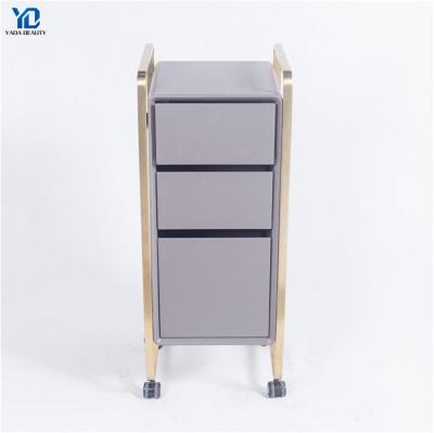 China Hot Sale New Super Useful Factory Cheap Lockable Rolling Beauty Barber Nail Storag Tray Cart Hairdressing Facial Hair Salon Trolley Gold for sale