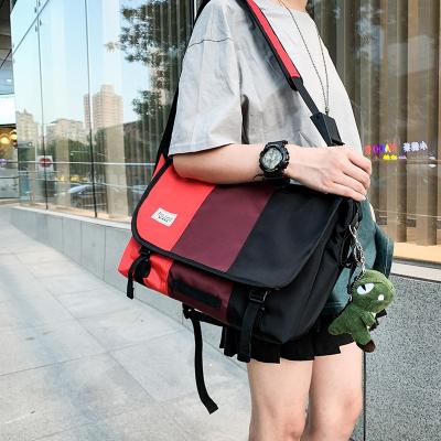 China New Oxford Wind Classic Fashion Brand Leisure Fashionable Men's Fashionable Cool Wind Messenger Cloth Shoulder Messenger Bag Men for sale