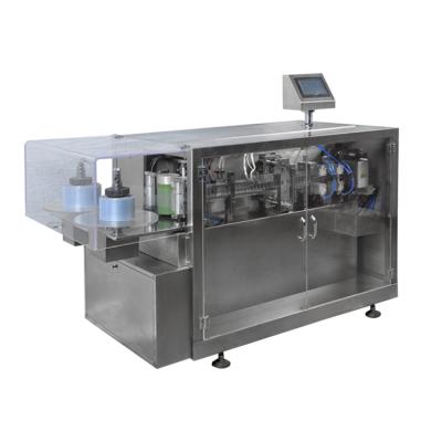 China mini food packing machine for bottles capacity 30ml for thick plastic blister forming packing machine en venta