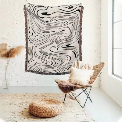 China PORTABLE Wholesale Customized Black and White Wavy Line Zebra Stripe Jacquard Newlanston Pattern Blanket for sale