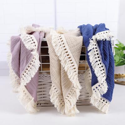 China Baby Towel Cotton Muslin Anti-static Soft Double Gauze Throw Blanket Swaddle Wrap Fringe Blankets for Newborn Baby Tassel for sale