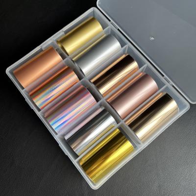 China New Arrival 10 Color Set Nail Art Foils Strip Roll Kinnco 4*50cm Nail Art Decorations Gold Silver Transfer Non-Toxic Foil for sale