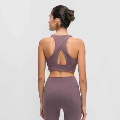 China Breathable High Waist Triangle Neck Breathable Summer Spring Women's Hollow Back Full Size Gym Racerback Sports Yoga Bra for sale