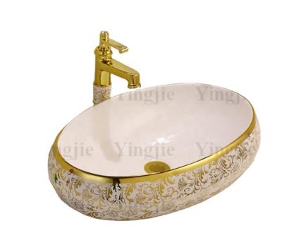 China Luxury Bathroom Mini Wash Round Art Ceramic Basin Bathroom Gold Electroplating Ceramic Sink for sale