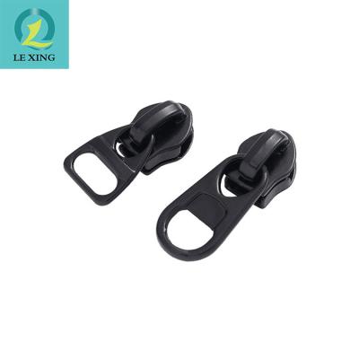 China Wholesale Cheap High Quality Black Color Zipper Pull Metal Zipper Sliders Custom Main Puller Factory Wholesale Nickel Free for sale