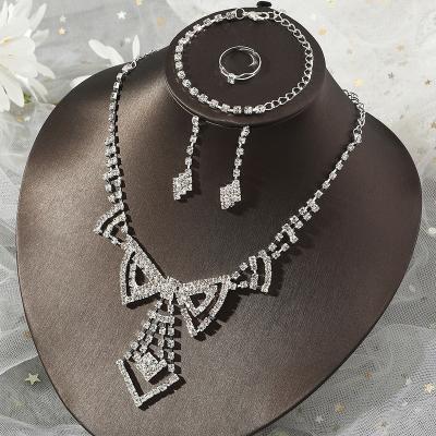 China FASHIONABLE European and American Wedding Full Sets of Diamond Pendant Necklace Earring Bracelet Ring Four Piece Bridal Jewelry for sale