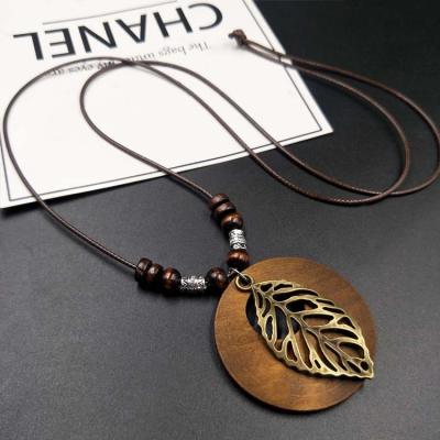 China TRENDY Retro Ethnic Wooden Pendant Clock Leaf Round Owl Long Chain Necklace Women Female Jewelry Neck Accessories Gifts for sale