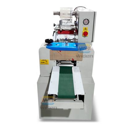 China Automatic Flowing Nuts Wrapping Food Bakery Packing Packing Machine for sale