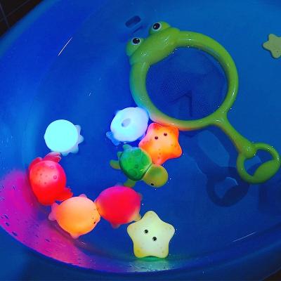 China Wetting Animal Sounding Toy 4pcs/set Baby Squeezes Bath Toys Induction Luminous Water Light Animal Floating Toys Water Baby Toy for sale