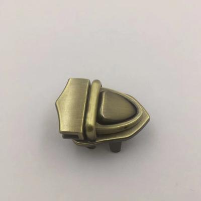 China Fashion Eco-friendly Brushed Metal Antique Brass Push Button To Insert Locks For Handbag for sale