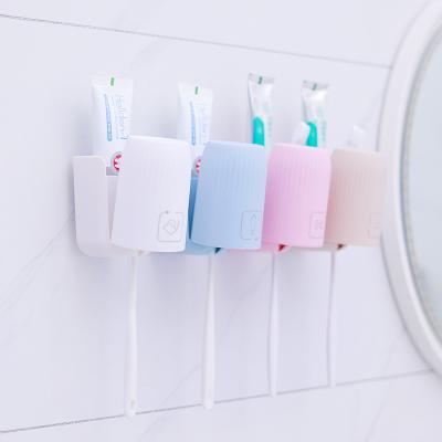 China Multi-Function High-end Dental Cylinder No Hole Type Electric Toothbrush Storage Holder Viable Tooth Wall Hanging Toilet Wall Mount De for sale