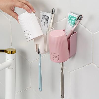 China Multifunctional High-end Dental Cylinder No Hole Type Electric Toothbrush Disposable Storage Rack Tooth Wall Hanging Toilet Wall Mount De for sale