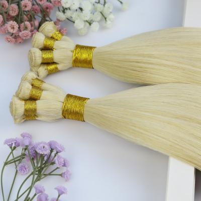 China Silky Straight Wave 100% human hair full cuticle Hand Sewn Weft Hair European top quality  Remy Hand Tied Weft Hair Extension for sale