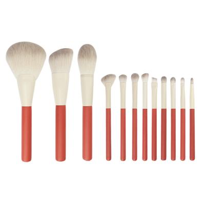 China Angular Blush Makeup Brush Set 12pcs Luxurious High Quality Private Label Eyeshadow Eyeshadow Orange Base Make Up Brush Set With Bag for sale