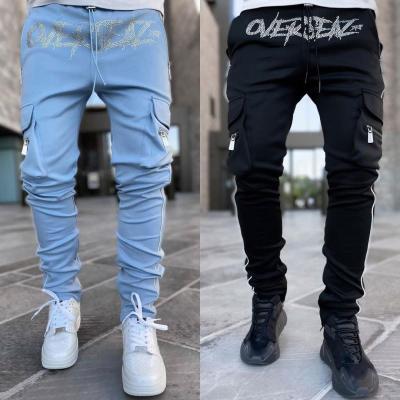 China QUICK DRY Hot Selling Sports Cargo Pocket Hot Drilling Pants For Casual Pocket Trackpants Men's Trackpants Mens Joggers Pants for sale