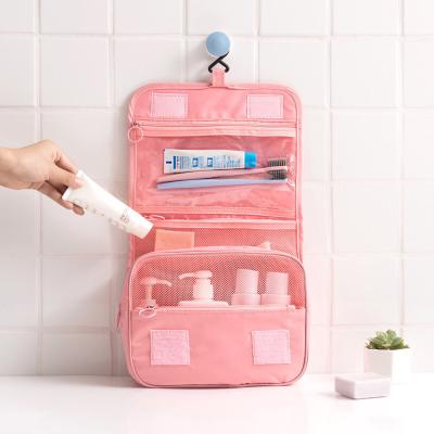 China Normcore/new minimalist toiletry bag travel hanging portable large capacity cosmetic bag color travel bag for sale