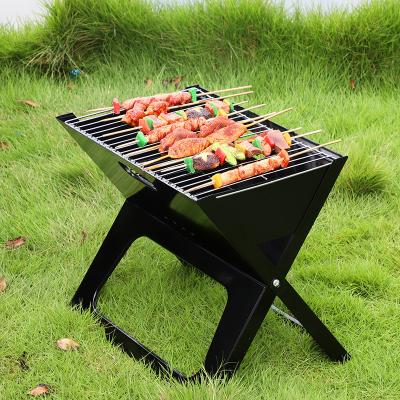 China Outdoor Portable Grill Charcoal Grills X Folding Grill BBQ for Camping Easily Cleaned for sale