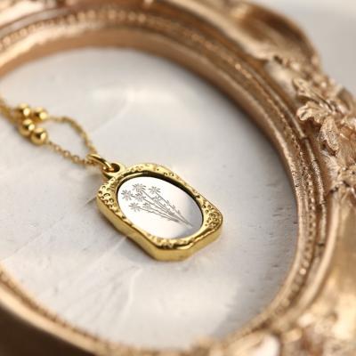 China Non Tarnish Hot Sales Engraved Wildflower Tasty 12 Month Birthstone Gold Birth Sign Necklace Women's Birthday Gift for sale