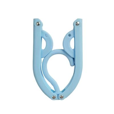 China Behind Doors/On Walls Popular Portable Travel Folding Non Slip Design Plastic Cloth Hanger for sale