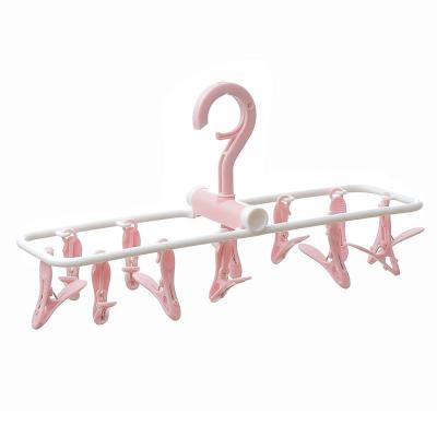 China Behind Doors/On Walls Good Selling Multifunction Folding Plastic Coat Hangers Clip Hangers for sale