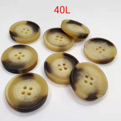 China 40L Four Holes Brown Buffalo Resin Washable Horn Button For Costume for sale