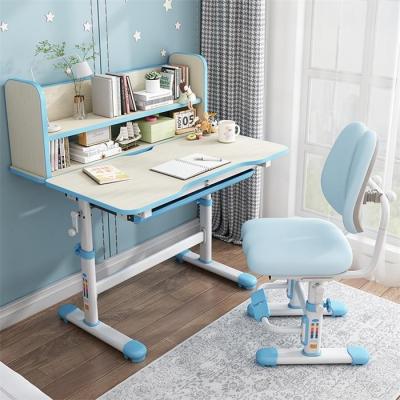 China Ergonomic comfort wholesale new product sell well home school height adjustable ergonomic student table and chair with shelf for sale