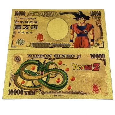 China Hotsale Japan DG Ball Foil Dragon Cartoon Gold Plastic Banknote Cards Classic Souvenir 10000 Yen Prop Money Anime Gifts for sale