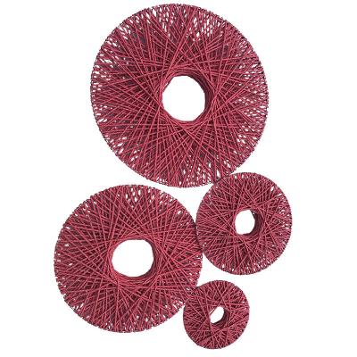 China Minimalist Handmade Straw Rope Woven UFO Wedding Props Flower Round Wall Decor for sale