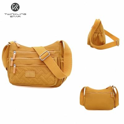 China 2022 Waterproof New Multi-compartment Nylon Line Embroidery Rhomboidal Cross Shoulder Large Capacity Body Bag for sale