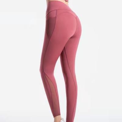 China 2022 Women Breathable Tight Hip Lift High Waist Fitness Sports Yoga Pants With Pockets for sale