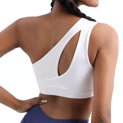 China Breathable Wholesale Sports Bra Women Fitness Activewear Gym Workout Set Sexy Single Shoulder Yoga Bra One for sale