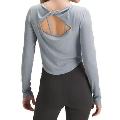 China ACTIVE Silk Yoga Twist-Back Long Sleeve Shirt Prevent Bacteria Fabric Creams Your Body Fit Over Waist Perfect With High Rise Pants for sale