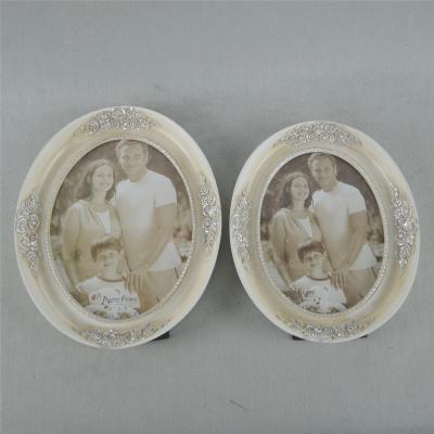 China Wholesale High Quality Resin Beautiful Girl Photo Frame Resin Home Decorations for sale