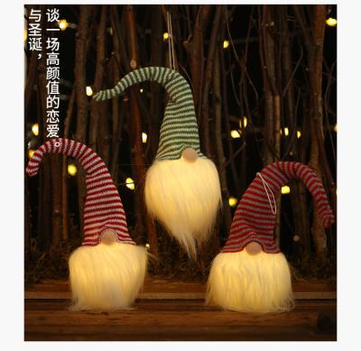 China Luminous Plush Hanging Toy Pendant Ornaments Santa Claus Toy Charm New Christmas Tree Plush Doll Faceless Ornament With Lights for sale