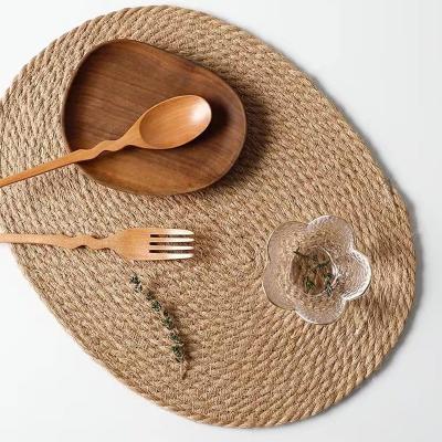 China Large Sustainable Woven Natural Oval Woven Place Mat Jute Kitchen Dining Table Mats for sale