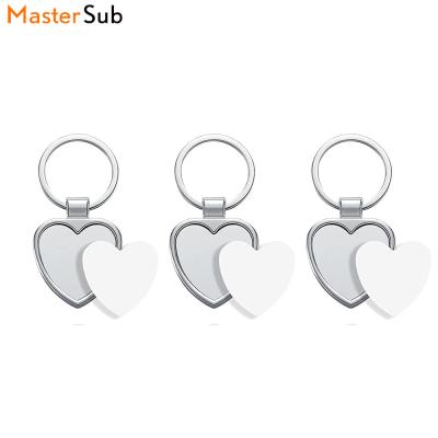 China Fashionable factory heart shape sublimation mute key chain, silver sublimation keychains wholesale for sale