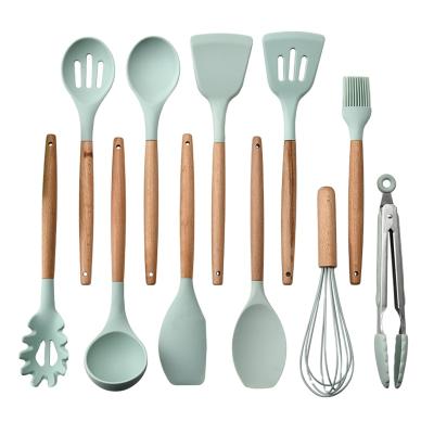 China Sustainable 12 Pieces In 1 Set Kitchen Gadgets Tools Rack Kitchenware Spatula Silicone Cookware Set With Wooden Handles for sale