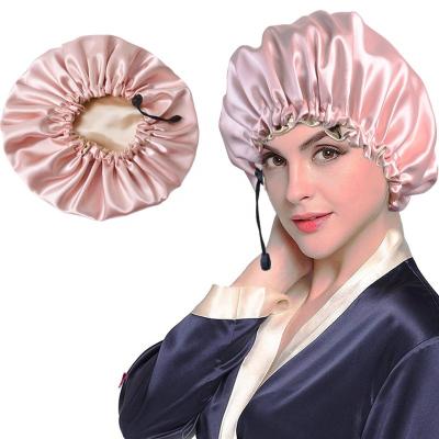 China Designers Adjustable Hair Picture Satin Double Layered Hoods Women's Hat Baking Soft Silk Bath Sleep Cap for sale