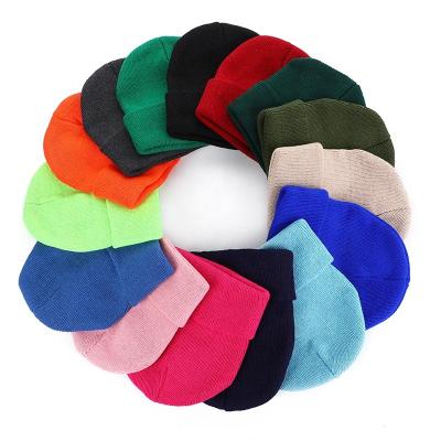 China Unisex solid color flat cap autumn and winter casual hat wholesale free size knit beanie custom hats custom logo for sale