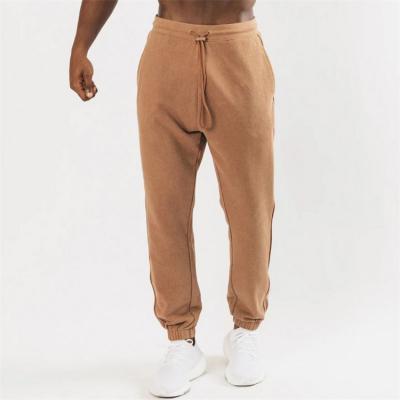 China Breathable OEM Stock Men Sports Fitness Training Jogger Breathable Male Pants for sale