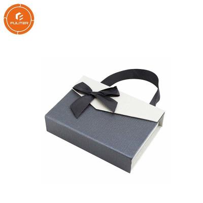 China Flap Closure Paper Gift Packaging Box , Paper Gift Bags With Handles for sale