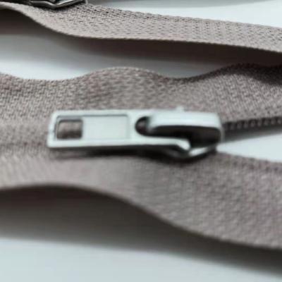 China Sustainable Environmental Protection Materials Zipper Sliders Coil Nylon Zipper for sale