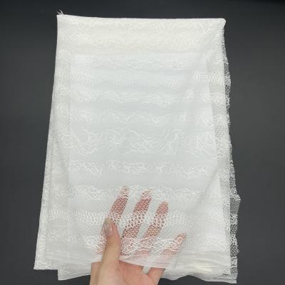 China Sustainable Lace Fabric Factory Dress White African Sequin Lace Fabric For Wedding for sale