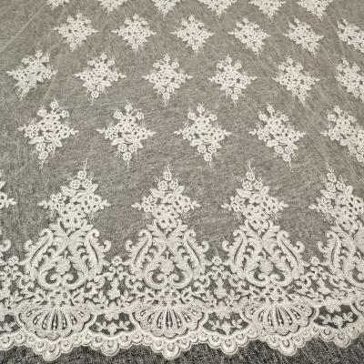 China Water Soluble White Tulle Net Embroidery Lace Mesh Luxury 3d Flower Lace Fabric For Wedding Dress for sale