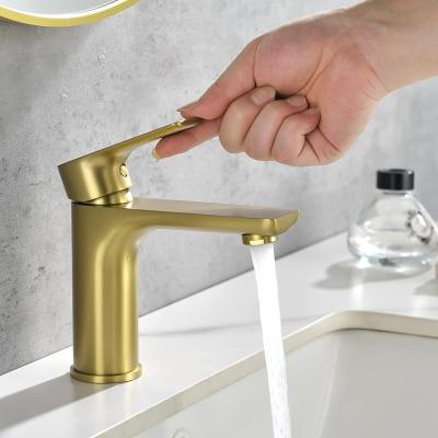 China Brass Single Hole Basin Faucet Gold Faucet Surface Metered Hot Cold Water Faucet for Basin Sink for sale