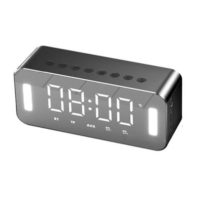 China AirPlay Mirror Desk Clock Electronic Alarm Calendar with BT Digital LED Speaker Foot Lamp and FM Radio Desk Clock for sale