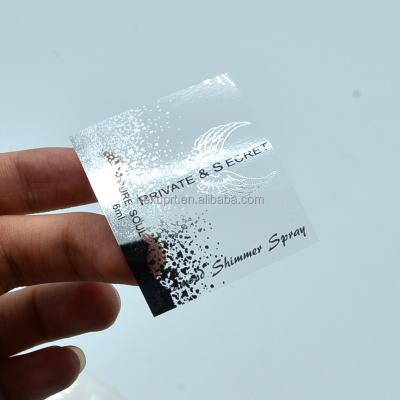 China Custom high quality waterproof transparent silver stamping foil label stickers, clear label with silver foil logo for sale