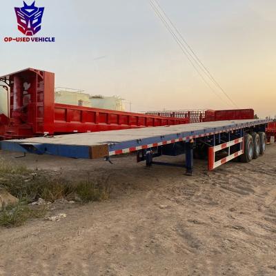 China Truck Trailer Used 3 Axles 40 Feet Shipping Flatbed Flat Bed Container Transport Truck Semi Trailers For Sale for sale