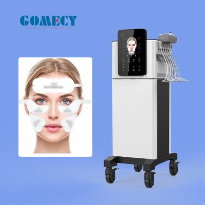 China Remover rugas Rf tonificar músculo facial estimular levantamento de pe-face EMS máquina de almofadas faciais à venda