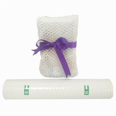 China Coreless Honeycomb Packing Biodegradable Paper Roll Biodegradable Protective Pad Damping White Craft Paper Packaging Envelope for sale